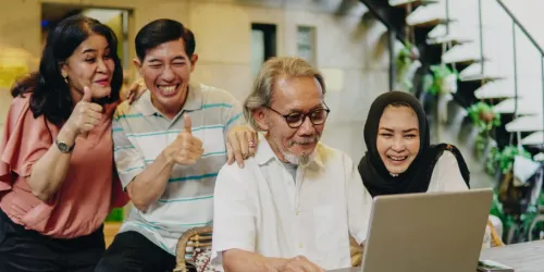 Family members of all ages using a computer together
